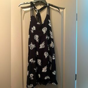 Black dress with white embroidered flowers. Size M